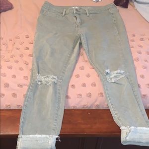 light green distressed denim jeans